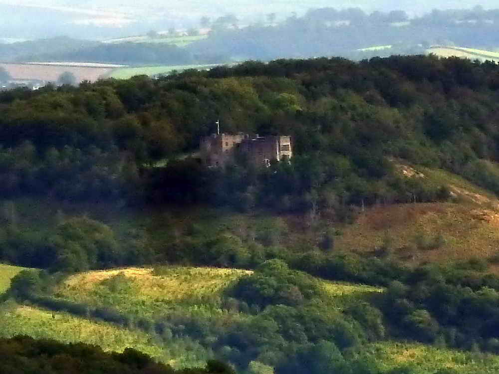Zoomed view to Castle Drogo, 6.6. km (4.1 miles) distant