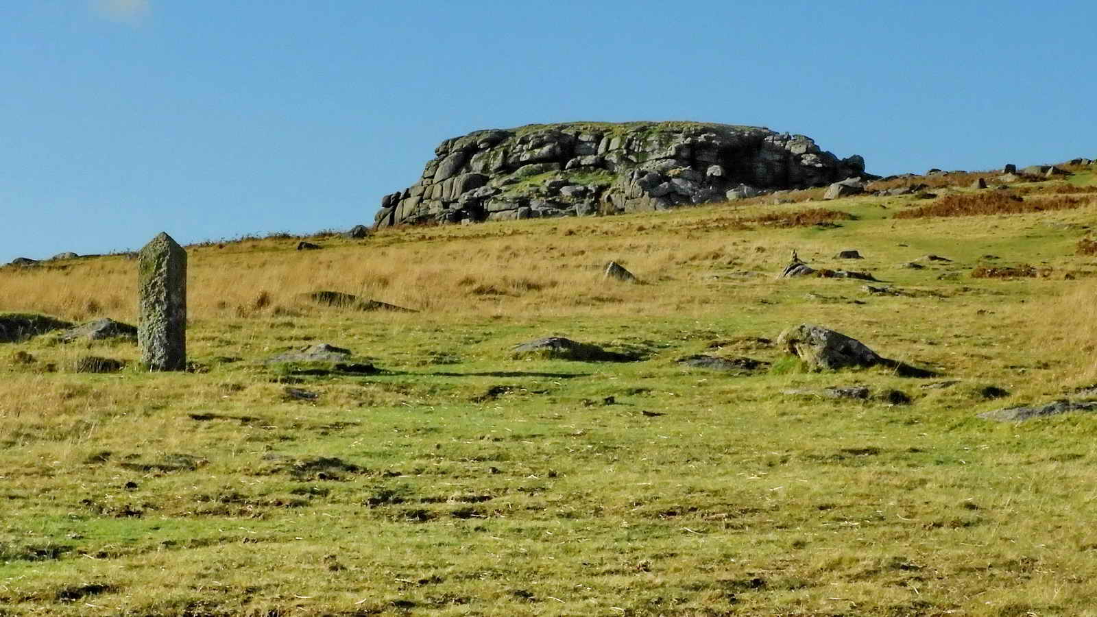 A granite pillar marking out the catchment area of the reservoir at Burrator, incised PCWW 1919